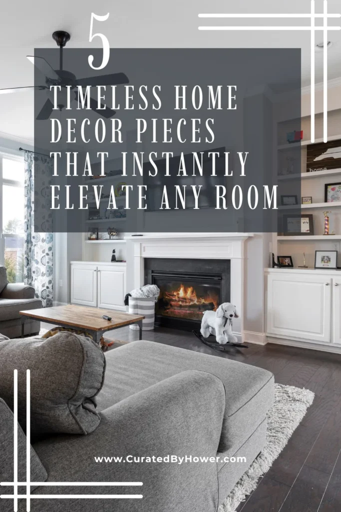 Elegant living room with gray sofa, fireplace, and built-in shelving showcasing timeless home decor pieces