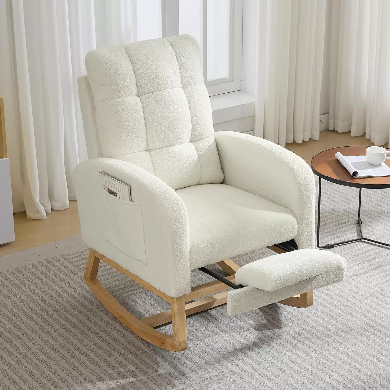 White leather rocking recliner chair with wooden base and extended footrest in modern nursery setting