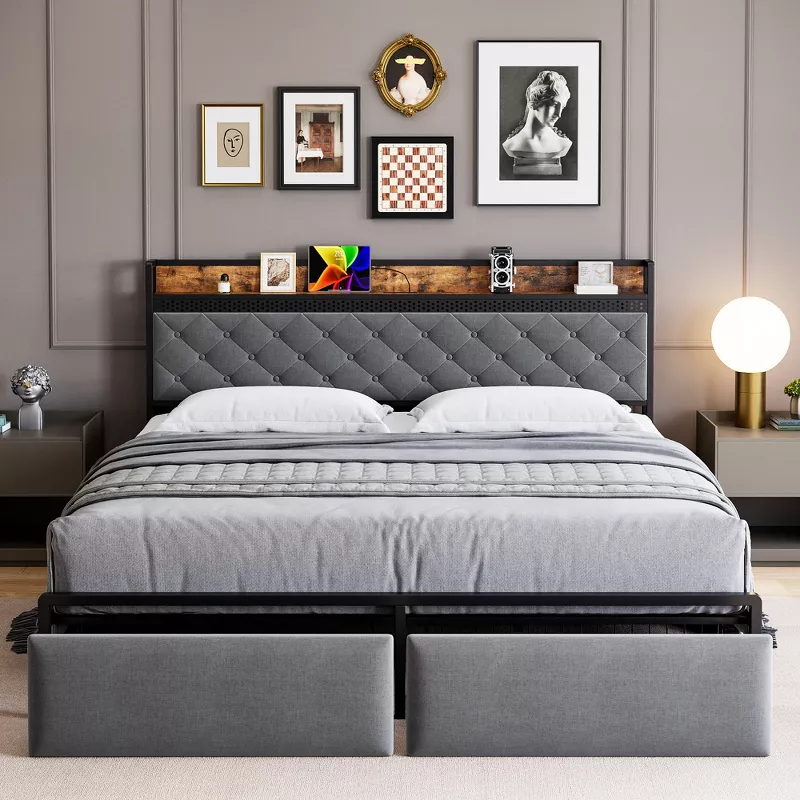 Gray upholstered platform bed with built-in storage drawers and padded headboard in modern bedroom setting