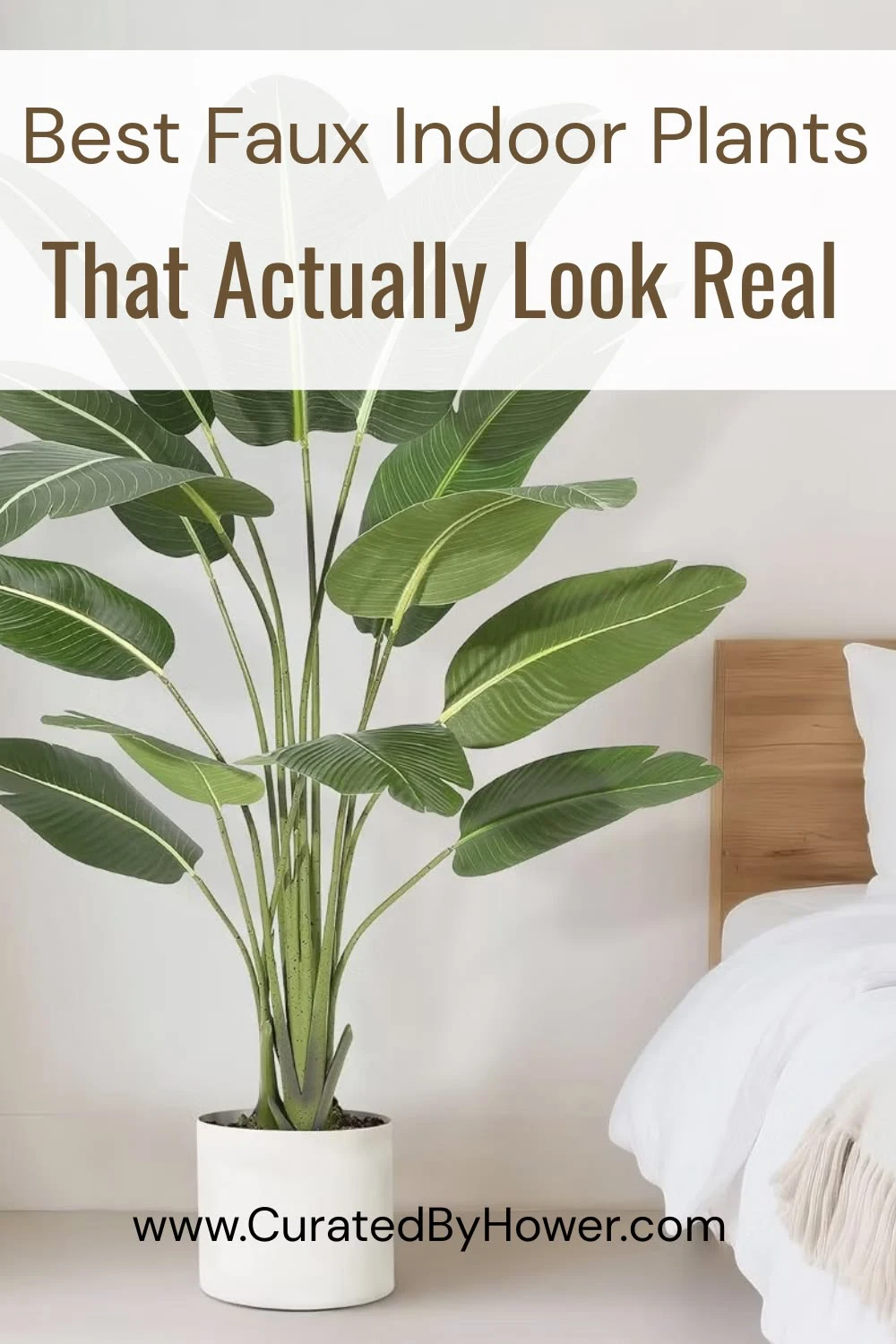 Realistic faux indoor plant in white pot next to wooden blocks against white wall