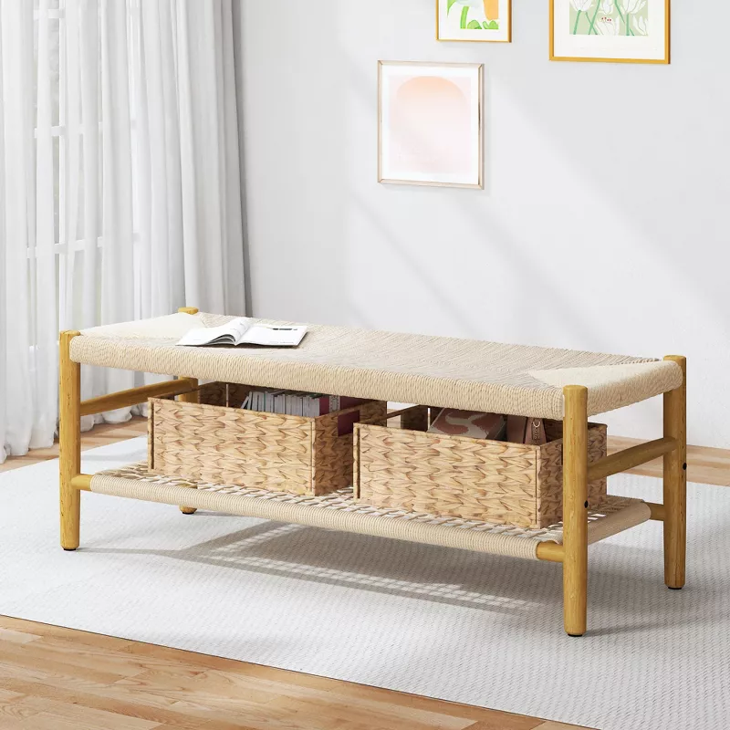 Modern wooden storage bench with woven baskets and cushioned top in bright minimalist living room