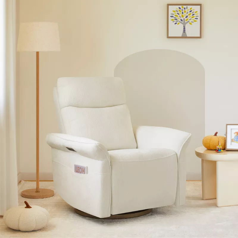 White electric recliner nursery chair with USB port in modern nursery room with wooden floor lamp and side table