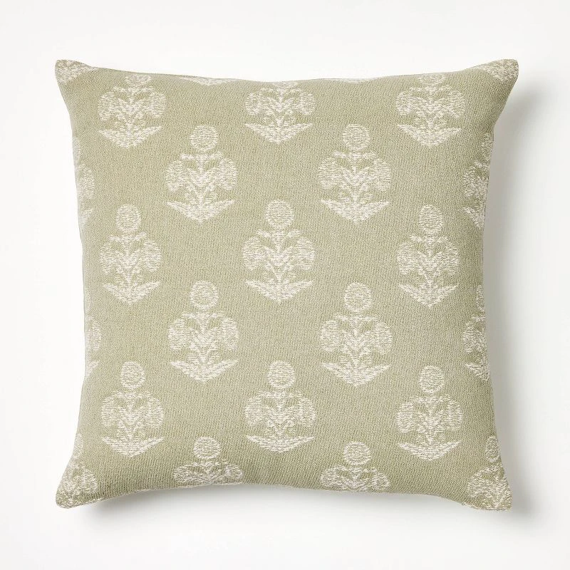 Neutral beige pillow with white damask pattern for modern home decor