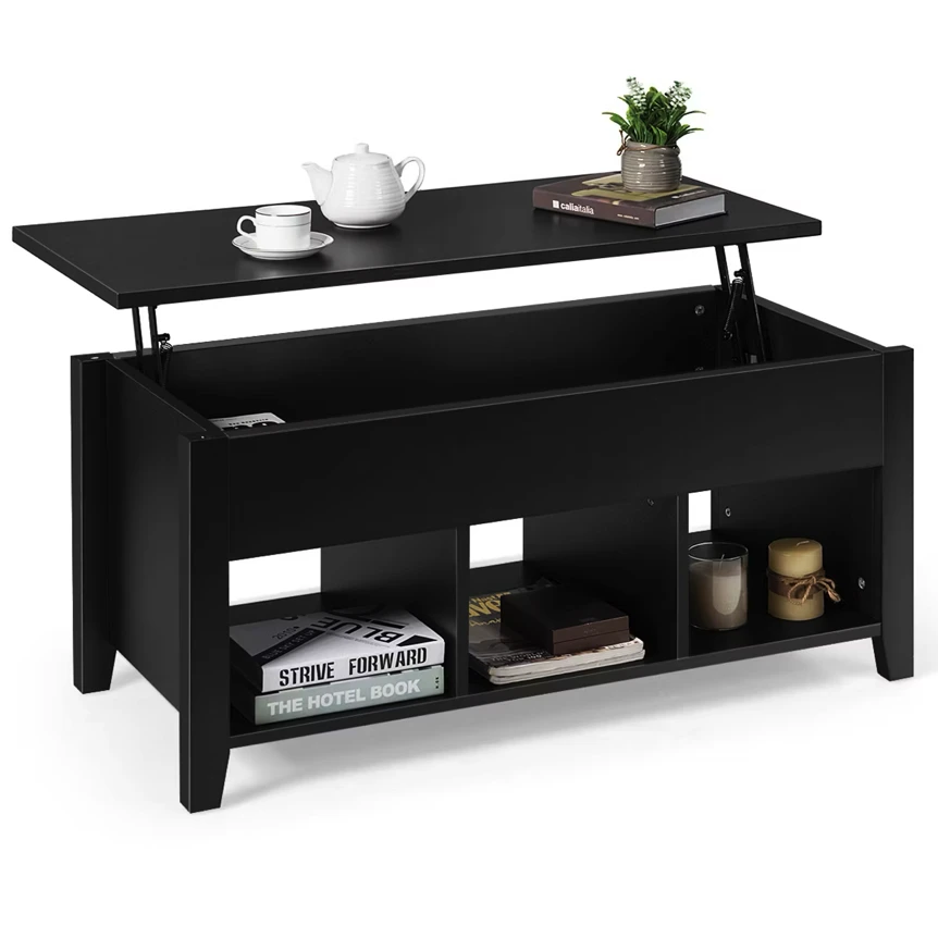 Lift top coffee table in black with raised surface, storage compartments, and lower shelf displaying books and decor
