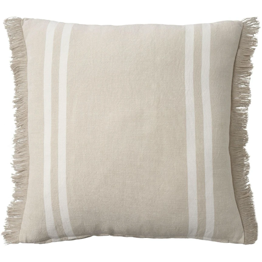 Beige linen pillow with white vertical stripes and fringe trim on neutral background