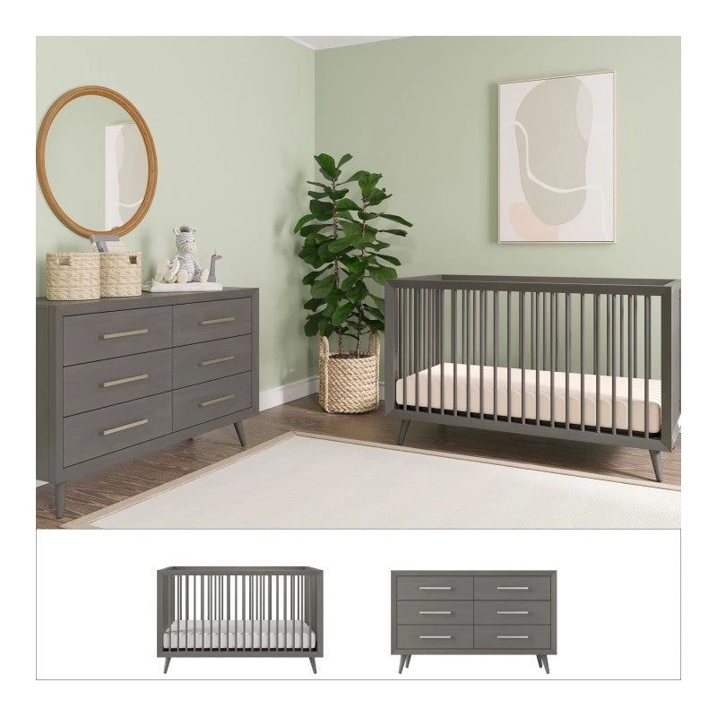Gray nursery furniture set with modern crib and dresser in sage green room with natural decor