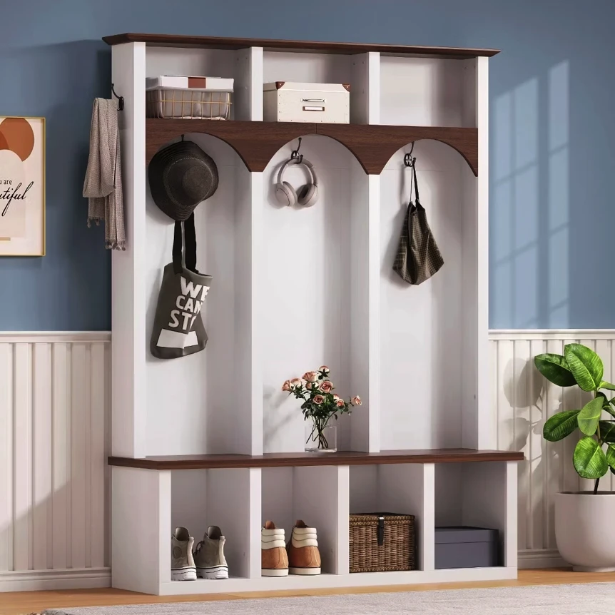 Hall tree with storage bench, coat hooks, and cubbies in white and brown wood finish for organized entryway