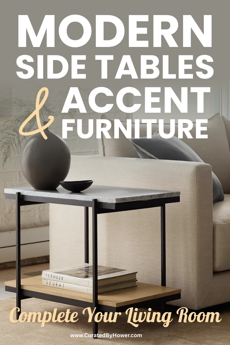 Modern side table with black top and metal frame next to beige sofa with decorative vase