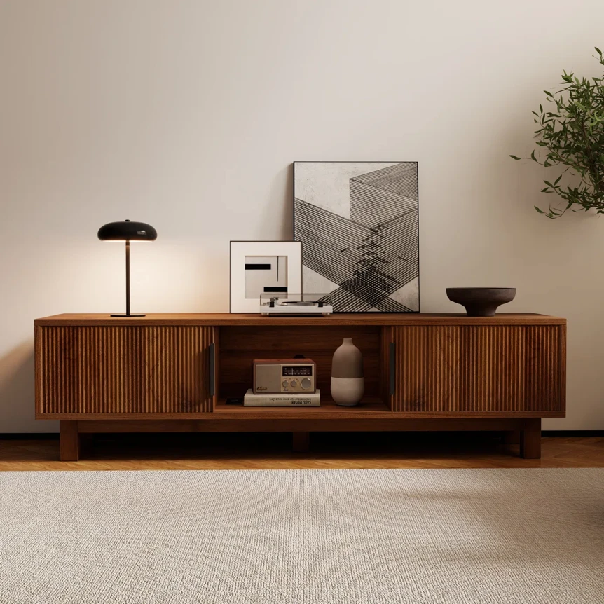 Modern wooden TV stand with fluted cabinet doors open shelving and minimalist decor in contemporary living room