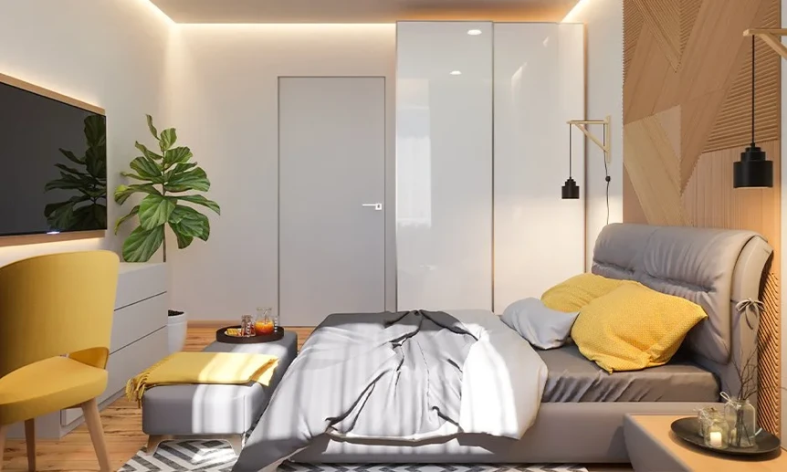 Modern small bedroom with yellow accents, gray bedding, wooden flooring, and space-saving furniture solutions