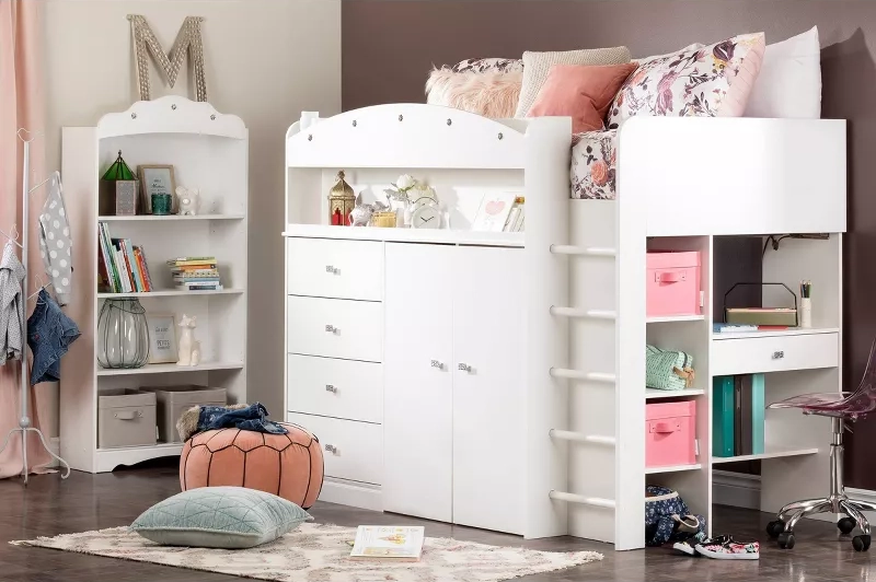 White storage furniture set for kids bedroom with cubbies, drawers, and colorful bins in modern playroom