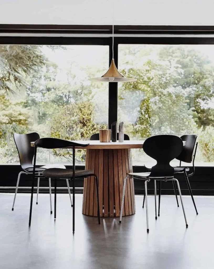 Black mismatched chairs mid century danish style dining nook My Style Vita 1