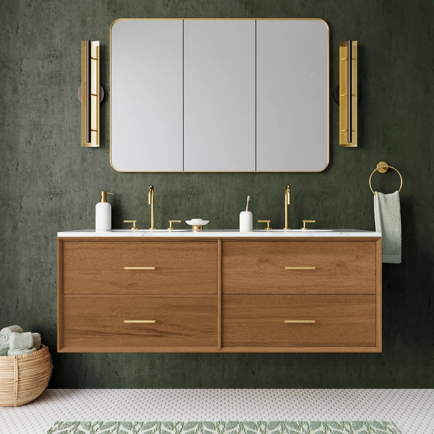 Modern floating double vanity in walnut wood with white countertop, gold fixtures, and rounded mirror on dark green wall