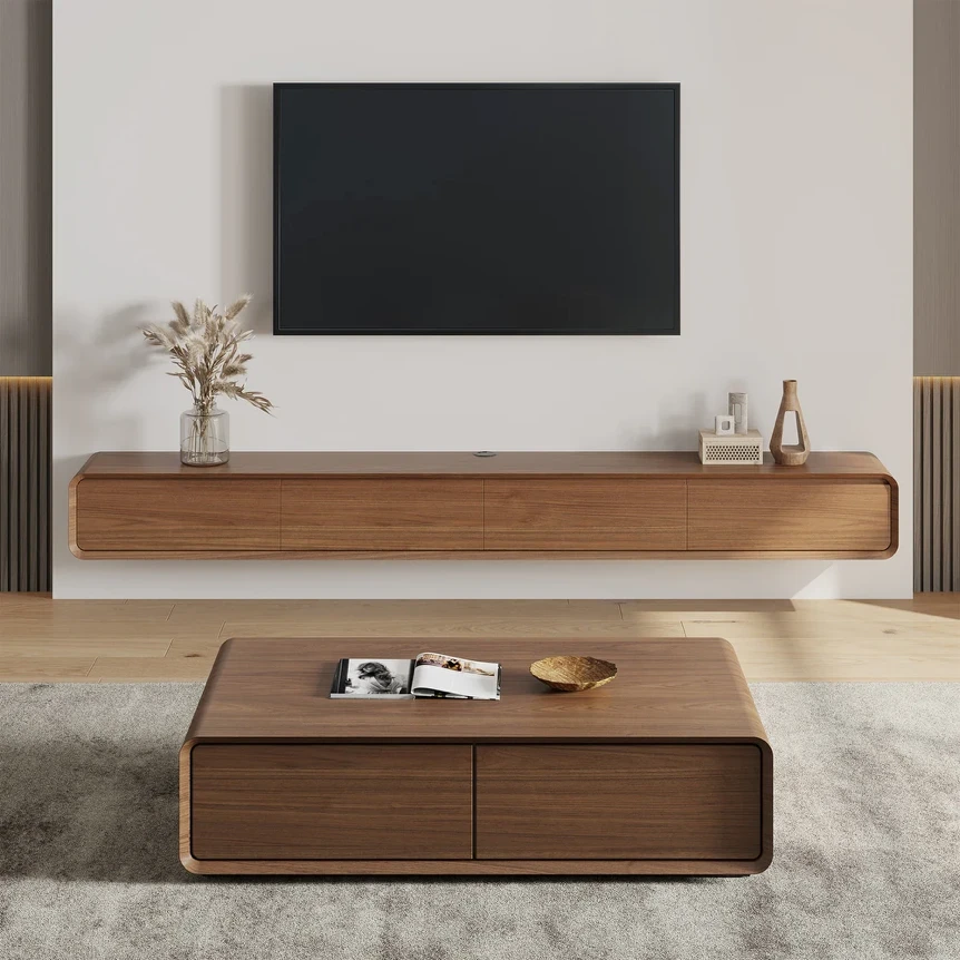 Modern walnut TV stand with floating console and matching coffee table in minimalist living room