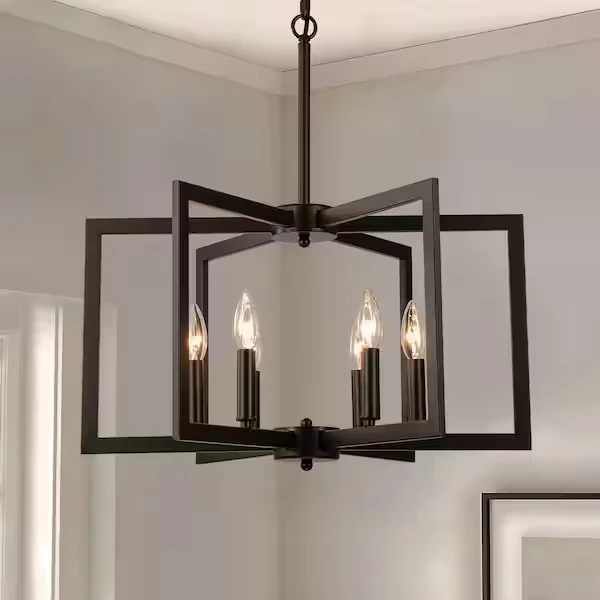 Modern geometric chandelier with black metal frame and candelabra bulbs hanging in contemporary living room