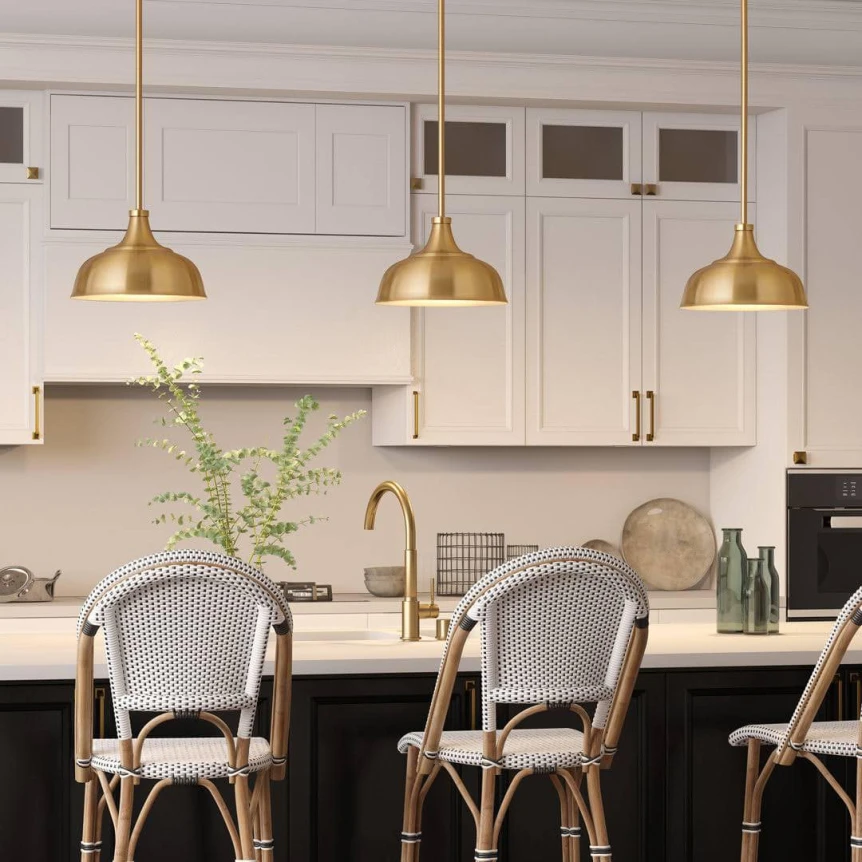 Kitchen with brass pendant lamps
