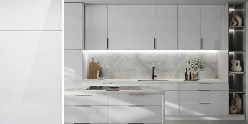 Modern gray kitchen cabinets with white marble countertops and minimalist black hardware in contemporary design