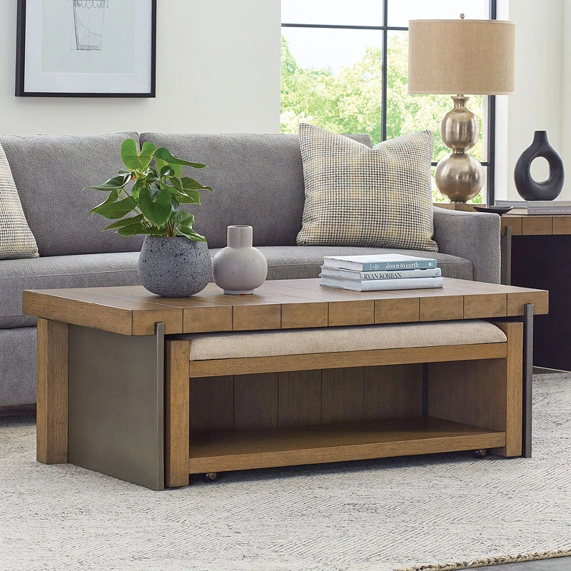 Modern wooden coffee table with storage shelf and nesting ottoman in contemporary living room setting
