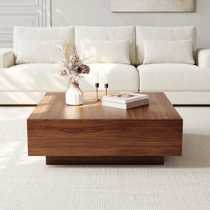 Modern walnut wood coffee table with white vase decor in front of cream sofa in minimalist living room