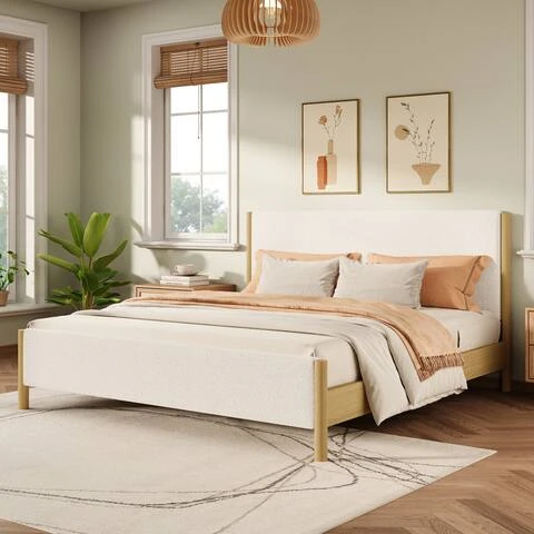 Modern Scandinavian platform bed in boucle upholstery with rubberwood legs and minimalist headboard