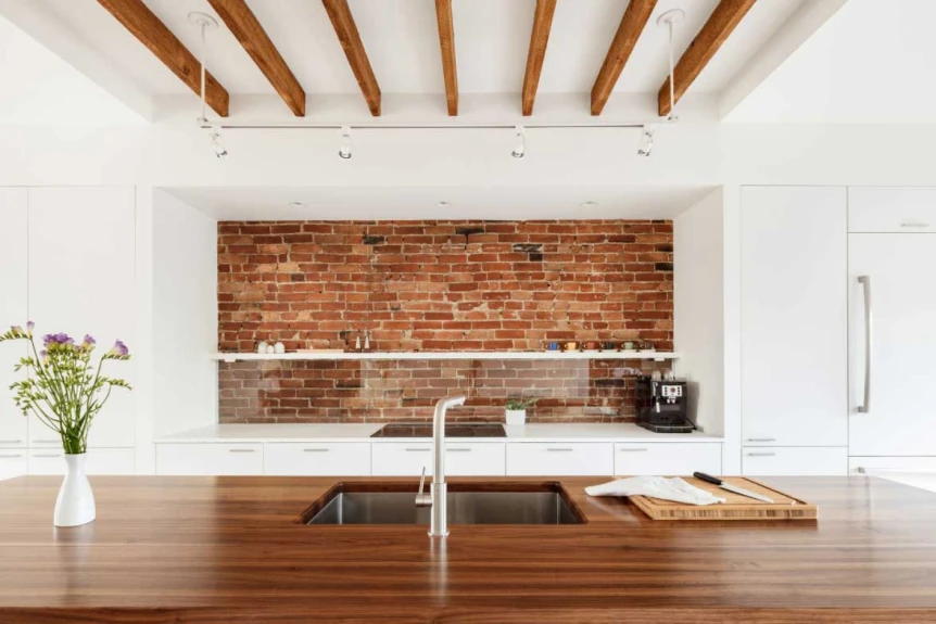 Exposed brick kitchen design wood countertop