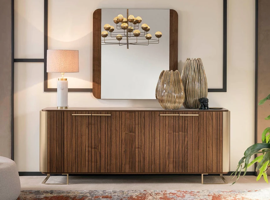 Modern wooden sideboard with mirror and decorative vases in contemporary living room setting