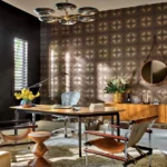 Midcentury inspired office with a desk at its center and a wooden cabinet resting on the back wall
