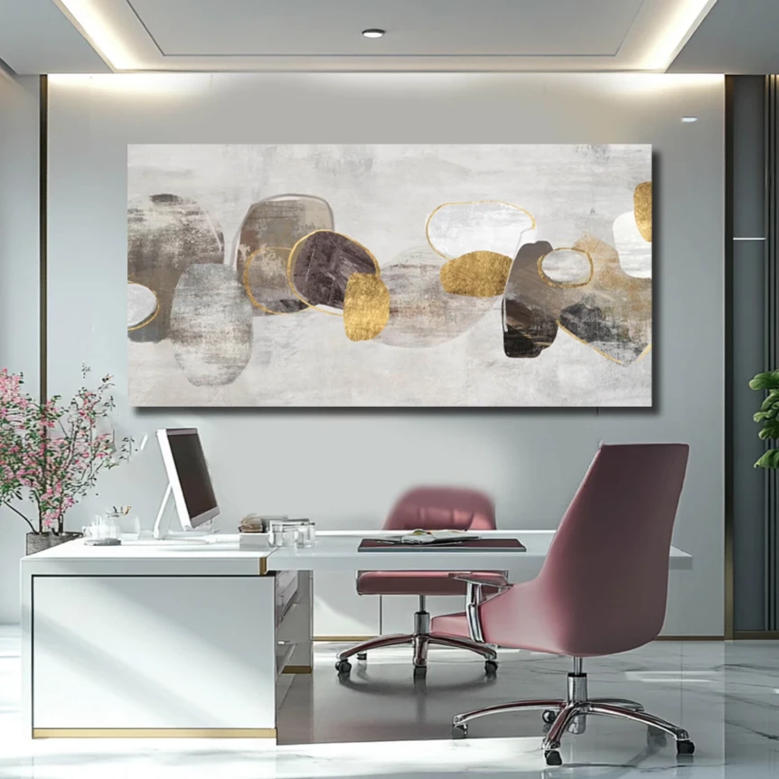 Modern minimalist home office with white desk, pink chair, and abstract artwork in neutral tones