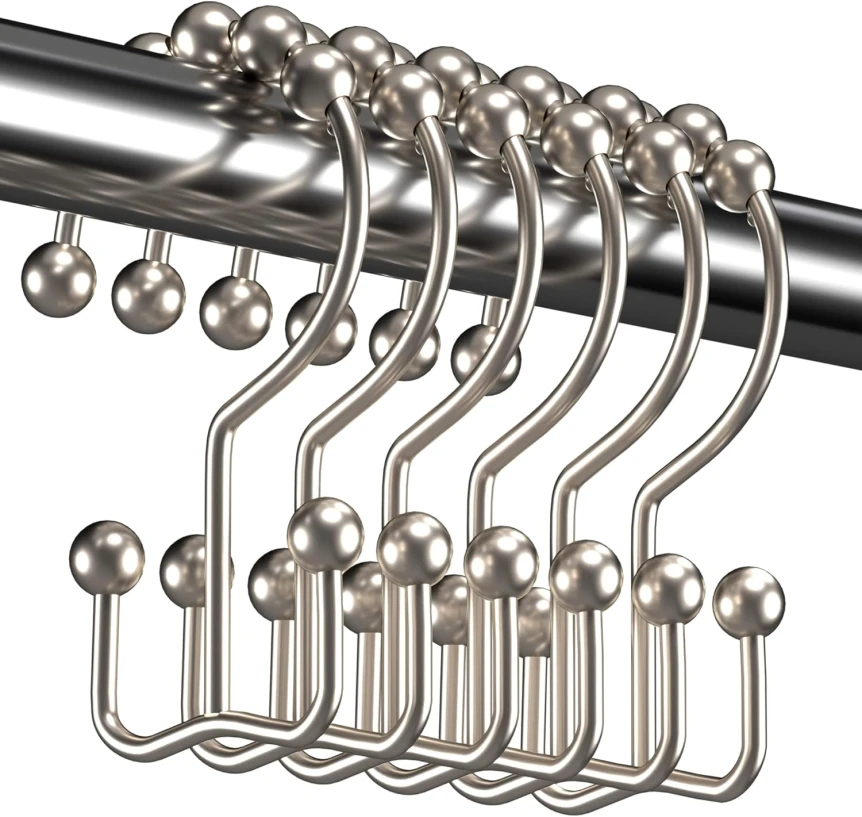 Stainless steel shower curtain hooks with ball bearing rollers hanging on chrome rod